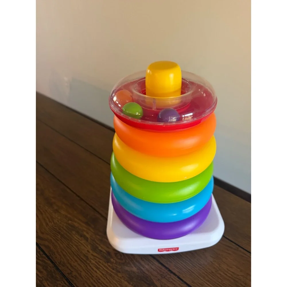 Fisher-Price Rock-a-Stack Rainbow Ring Stacker Baby Toy with Rattle Beads